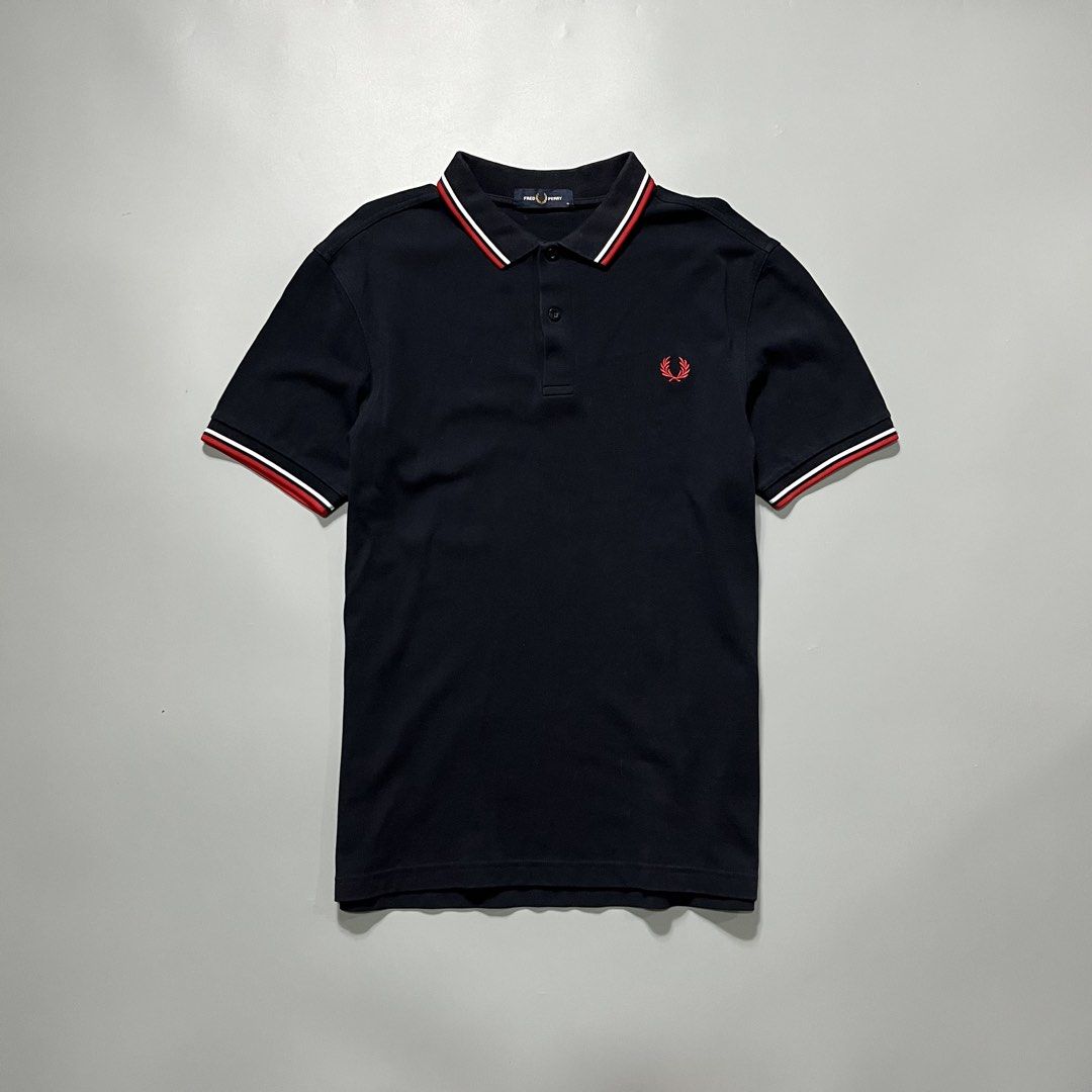 Fred Perry Polo shirt Navyblue (Category: Tshirts & Polo Shirts ) located in Angeles City. Submitted by jthrifted.clothes (Listing ID 1463871983, Image 1). Description: Fred Perry Polo shirt Navyblue Medium 19x27 Good condition Color rate 9.5/10 Issue slightly fade collar line.