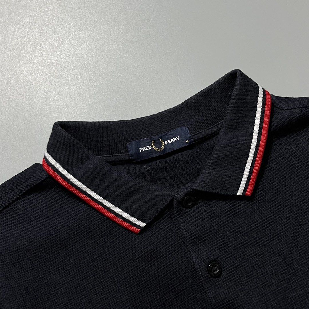 Fred Perry Polo shirt Navyblue (Category: Tshirts & Polo Shirts ) located in Angeles City. Submitted by jthrifted.clothes (Listing ID 1463871983, Image 3). Description: Fred Perry Polo shirt Navyblue Medium 19x27 Good condition Color rate 9.5/10 Issue slightly fade collar line.