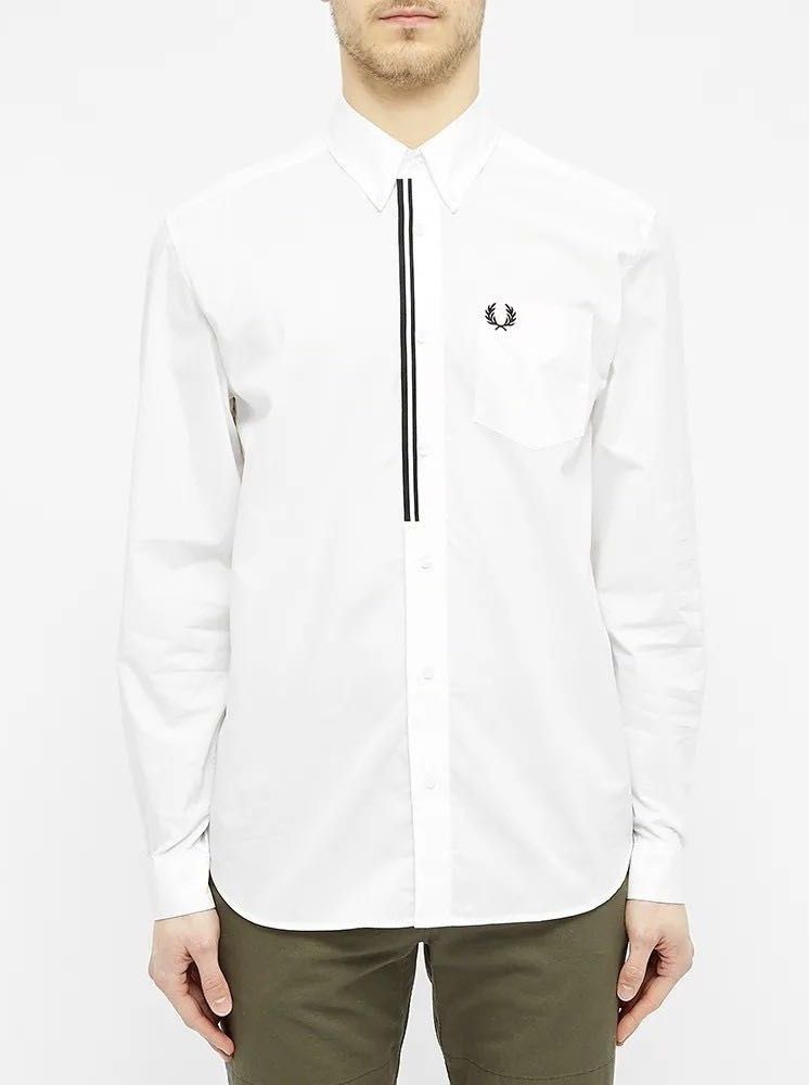Fred Perry Taped Placket Buttondown Longsleeve (Category: Formal Shirts) located in Imus. Submitted by rckrmns (Listing ID 1463790825, Image 1). Description: Fred Perry Taped Placket Buttondown Longsleeve Size XS W- 18 L- 27 Good as new no issues .
