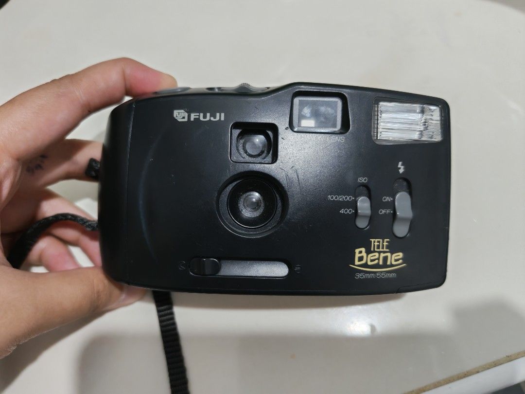 Fujifilm Tele Bene 35mm Point and Shoot Camera (Category: Cameras) located in Imus. Submitted by aey_crcd (Listing ID 1463780314, Image 1). Description: - Fujifilm Tele Bene Camera (Black) - Film Type: 35mm - ISO Settings: 100/200 and 400 - Built-in Flash - Tested RFS - Nakatambak lang brought for ₱3,500 Hindi na din nagamit 📍IMUS CAVITE .