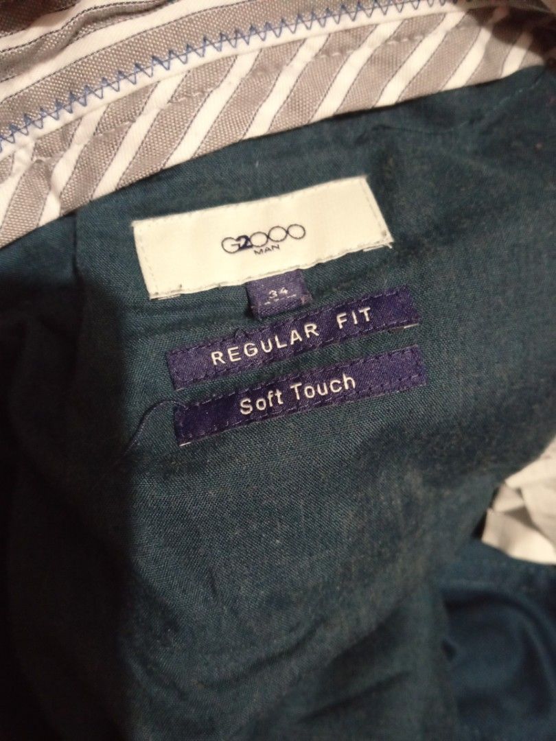 G2000 Man Regular Fit jeans (Category: Chinos) located in Cainta. Submitted by ziannika28 (Listing ID 1463816028, Image 3). Description: - G2000 Man Chinos - Size: waist 34 -Length:36 inch -Color may different due to camera lightning -Actual color: Dark Green - Fit: Regular - Fabric: Soft touch - Style: Versatile for casual or smart casual wear - Closure: Button and zip.