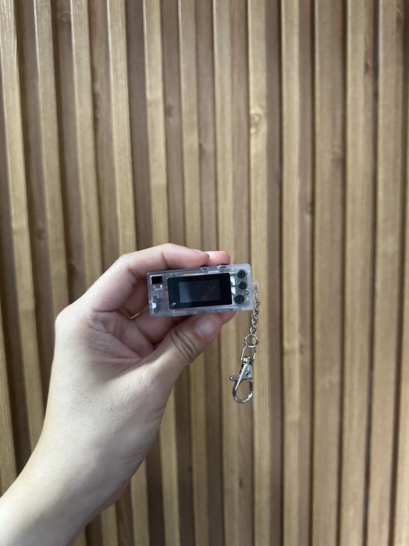 G6 Thumb Camera Keychain Digital Camera (Category: Cameras) located in Lala. Submitted by thirdeclutter (Listing ID 1463767701, Image 3). Description: TAKE 2 CHARMERA FOR 1,200 - Super tiny digital camera keychain - Retro design, reminiscent of 1984 cameras - Small screen on the back with buttons - Comes with keychain attachment - Great for novelty or as a fun accessory - Small, portable, and easy to carry RFS: DECLUTTERING LBC SHIPPING NATIONWID