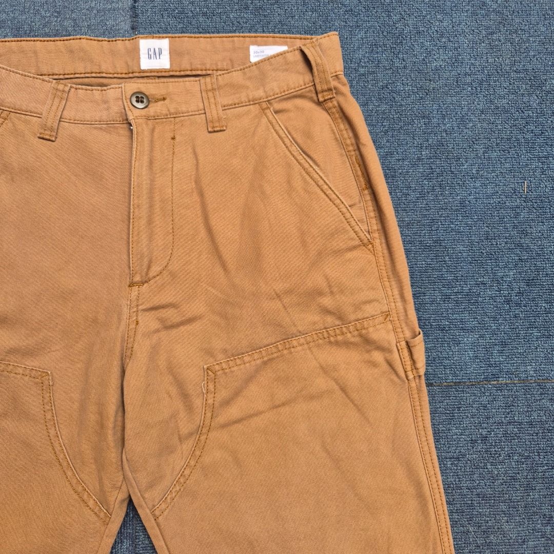Gap '90s Loose Canvas Double-Knee Carpenter Pants (Brown) (Category: Chinos) located in Consolacion. Submitted by thrift.ting (Listing ID 1463904384, Image 2). Description: Condition: 9.5/10 Color rate: 9/10 Actual Measurements (Laid Flat): Waist: 15 Front Rise: 10" Inseam: 30" Outseam / Total Length: 40" Leg Opening: 8" (Clean straight, loose-stacking cut) Up for grabs is an authentic pair of Gap '90s Loose Canvas Double-Knee Carpenter Pants in 