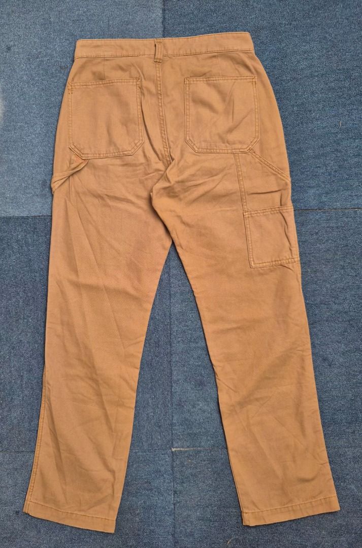 Gap '90s Loose Canvas Double-Knee Carpenter Pants (Brown) (Category: Chinos) located in Consolacion. Submitted by thrift.ting (Listing ID 1463904384, Image 3). Description: Condition: 9.5/10 Color rate: 9/10 Actual Measurements (Laid Flat): Waist: 15 Front Rise: 10" Inseam: 30" Outseam / Total Length: 40" Leg Opening: 8" (Clean straight, loose-stacking cut) Up for grabs is an authentic pair of Gap '90s Loose Canvas Double-Knee Carpenter Pants in 