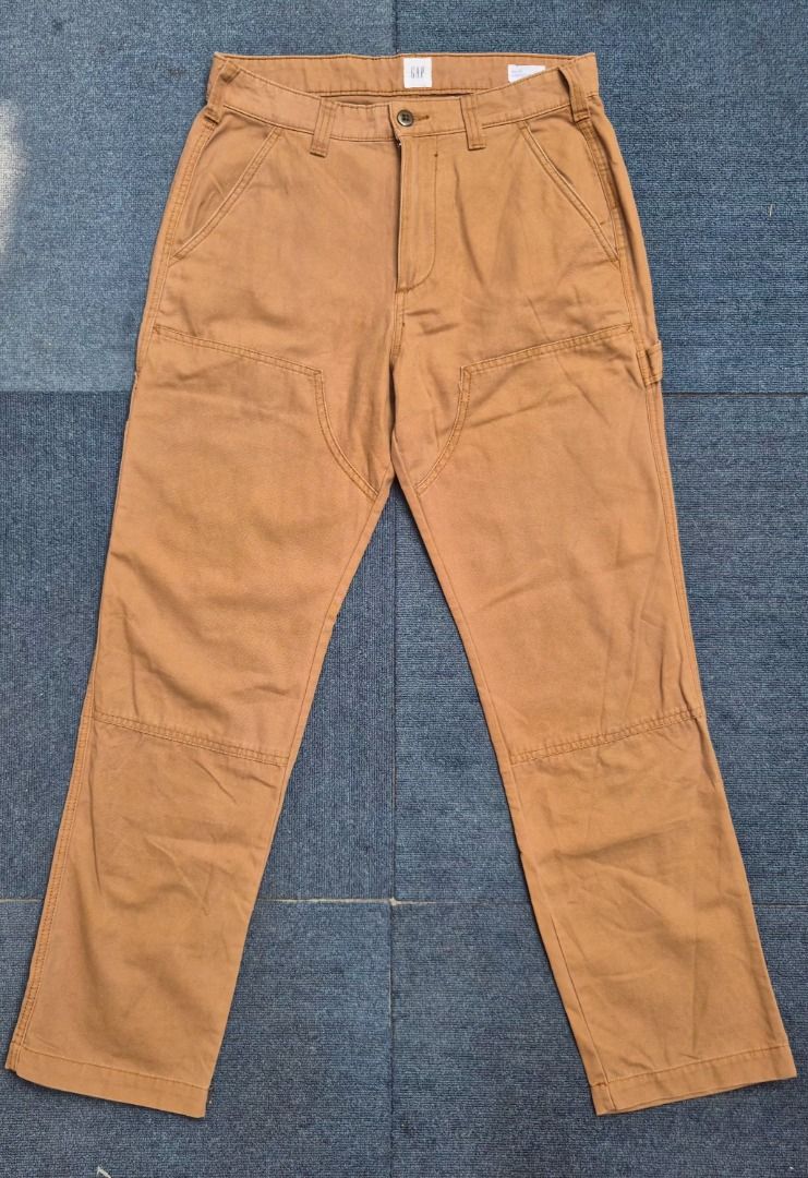 Gap '90s Loose Canvas Double-Knee Carpenter Pants (Brown) (Category: Chinos) located in Consolacion. Submitted by thrift.ting (Listing ID 1463904384, Image 1). Description: Condition: 9.5/10 Color rate: 9/10 Actual Measurements (Laid Flat): Waist: 15 Front Rise: 10" Inseam: 30" Outseam / Total Length: 40" Leg Opening: 8" (Clean straight, loose-stacking cut) Up for grabs is an authentic pair of Gap '90s Loose Canvas Double-Knee Carpenter Pants in 