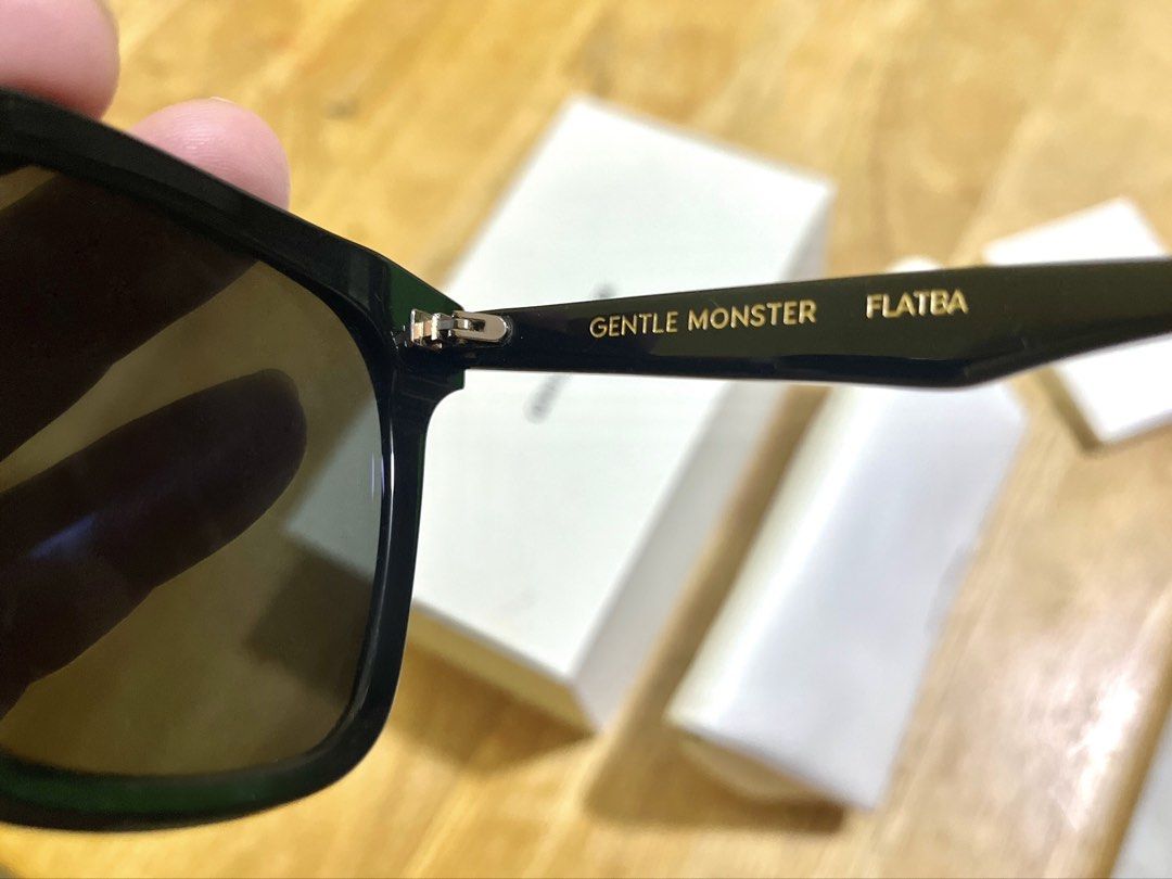 Gentle Monster HER-01 (2024) (Category: Sunglasses & Eyewear) located in Manila. Submitted by zoozoomo (Listing ID 1463909222, Image 3). Description: Gentle Monster HER-01 sunglasses 2024 - Color: Black - Condition: Like new (rarely worn) - Includes: Original box, case, and papers - Authenticity: Purchased from Gentle Monster Tokyo Aoyama, serial number included Price: 12,000 Location: Manila/Makati.