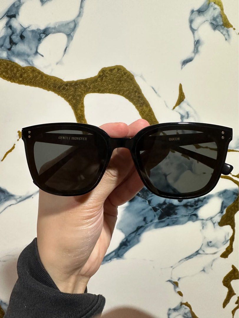 AUTHENTIC Gentle Monster Queen Sunglasses Black (Category: Sunglasses & Eyewear) located in Sariaya. Submitted by ja0111 (Listing ID 1463897086, Image 1). Description: - Authentic Gentle Monster sunglasses - Bought sa BGC Gentle Monster for 13650 - Classic black frame with dark lenses - Comes with original box, pouch and receipt.