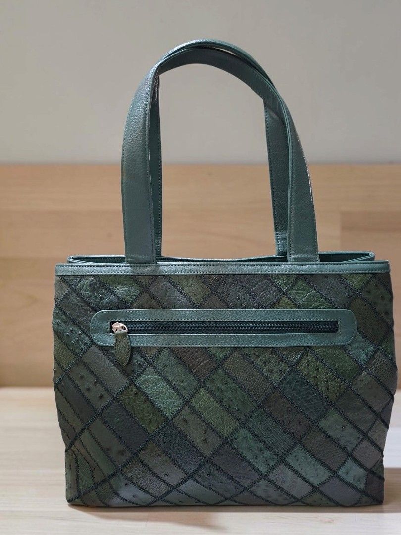 GENUINE OSTRICH LEATHER PATCHWORK TOTE BAG (Category: Tote Bags) located in Las Pinas. Submitted by annachiaonair2037 (Listing ID 1463806041, Image 3). Description: GENUINE OSTRICH LEATHER PATCHWORK TOTE BAG FROM JAPAN INNER VELVET LINING 2 COMPARTMENTS 1 ZIP CLOSURE 1 MAGNETIC LOCK CLOSURE HANDLE DROP 9" H 11.5" L 14.5" W 4.5".