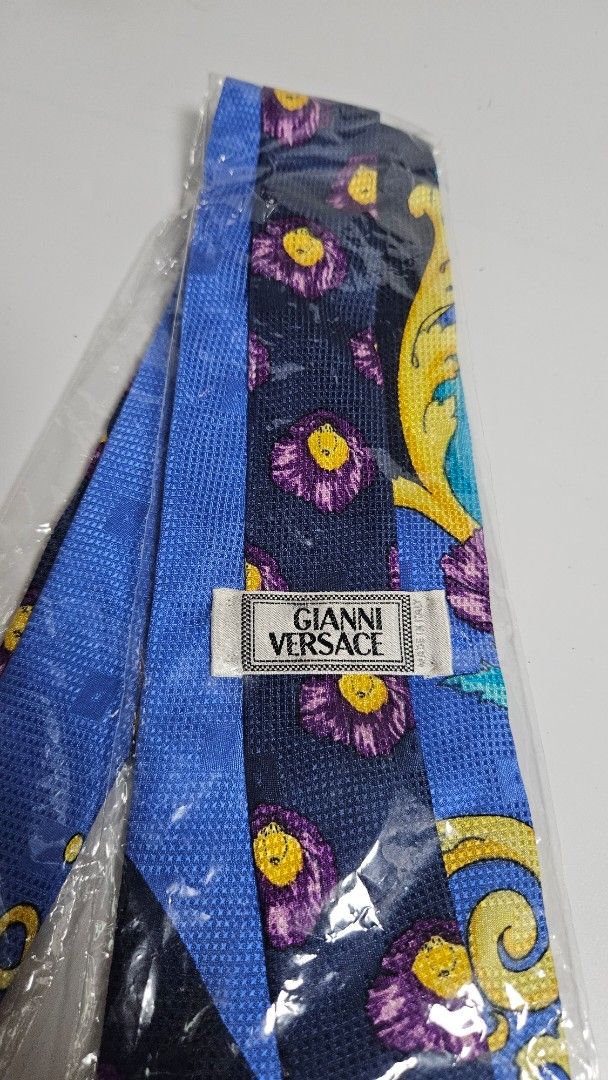 Gianni Versace Silk Tie (Category: Ties) located in Alfonso. Submitted by jbcamet (Listing ID 1463823298, Image 1). Description: - Authentic Gianni Versace Tie - Vibrant Floral & Baroque Pattern - 100% Silk - Made in Italy - Includes Original Packaging.