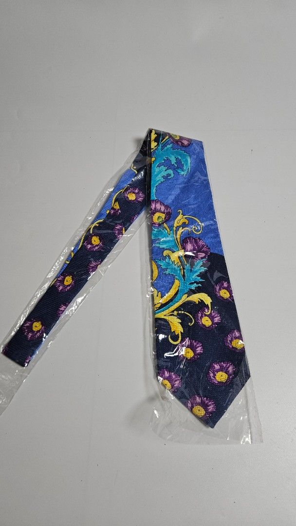 Gianni Versace Silk Tie (Category: Ties) located in Alfonso. Submitted by jbcamet (Listing ID 1463823298, Image 2). Description: - Authentic Gianni Versace Tie - Vibrant Floral & Baroque Pattern - 100% Silk - Made in Italy - Includes Original Packaging.