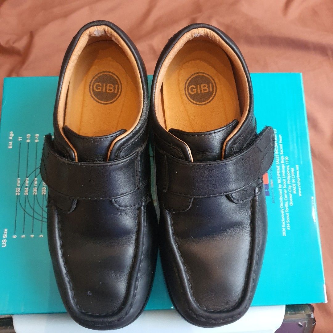 GIBI Black Leather Velcro Strap Shoes Size 30 (Category: Babies & Kids Fashion) located in Quezon City. Submitted by wenaileditconstruction (Listing ID 1463778947, Image 3). Description: - Brand: GIBI - Color: Black - Material: Leather - Closure: Easy velcro straps (great for kids!) - Size: Marked as 30 on the sole - Ideal for: School or everyday wear - Condition: Comes with original box.