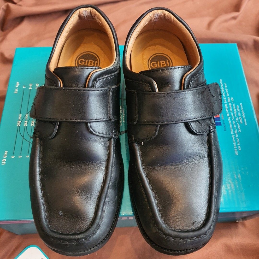 GIBI Black Leather Velcro Strap Shoes Size 30 (Category: Babies & Kids Fashion) located in Quezon City. Submitted by wenaileditconstruction (Listing ID 1463778947, Image 2). Description: - Brand: GIBI - Color: Black - Material: Leather - Closure: Easy velcro straps (great for kids!) - Size: Marked as 30 on the sole - Ideal for: School or everyday wear - Condition: Comes with original box.