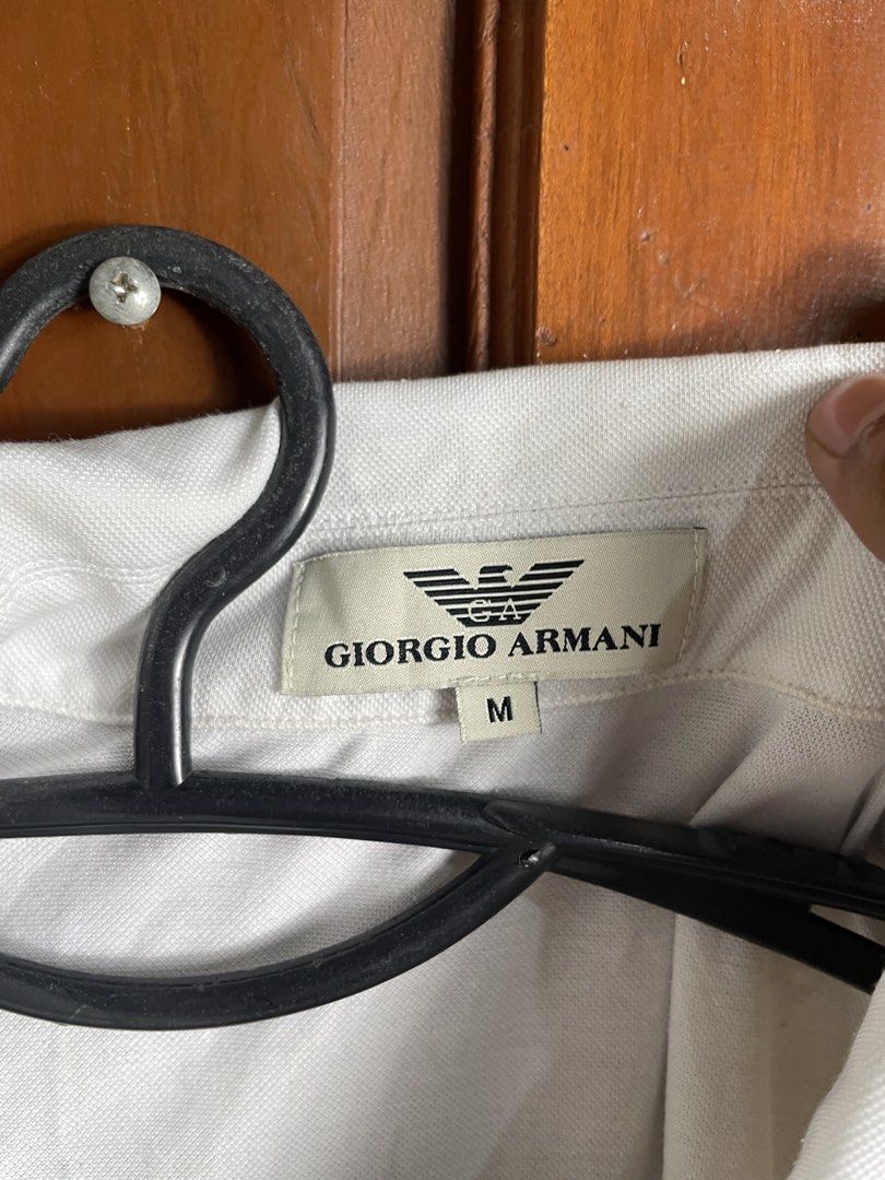 Giorgio armani plaid polo (Category: Activewear) located in Urdaneta. Submitted by northdrops_asian (Listing ID 1463874635, Image 3). Description: Excellent condition .