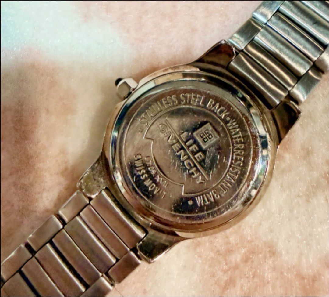 Givenchy (Category: Women's Watches) located in Manila. Submitted by candaceonlineph (Listing ID 1463924341, Image 3). Description: G!venchy women’s watch, a classic black dial with Roman numerals and a matching silver-tone link bracelet. ₱9,999 Open for layaway. Disclaimer: We are not affiliated, associated, authorized, endorsed by or in any way officially connected with any other company or luxury brand. All copyrights are reserved to the origi