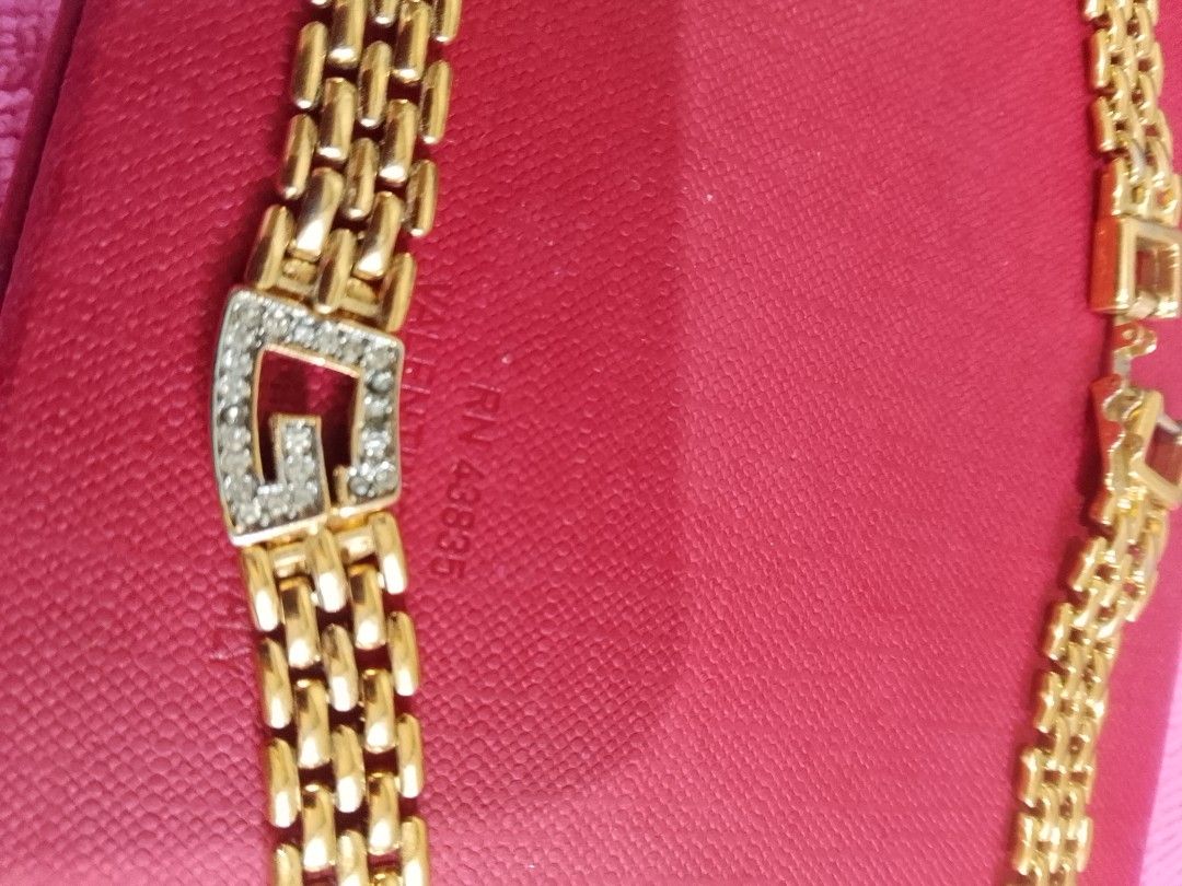 Givenchy necklace (Category: Necklaces) located in Cagayan de Oro. Submitted by brex7 (Listing ID 1463767729, Image 2). Description: - Chunky gold tone necklace - Distinctive G-shaped buckle clasp with small stones - Nice weight to the chain - Clasp works well - Perfect accessory to dress up any outfit - Selling as it's not frequently worn.