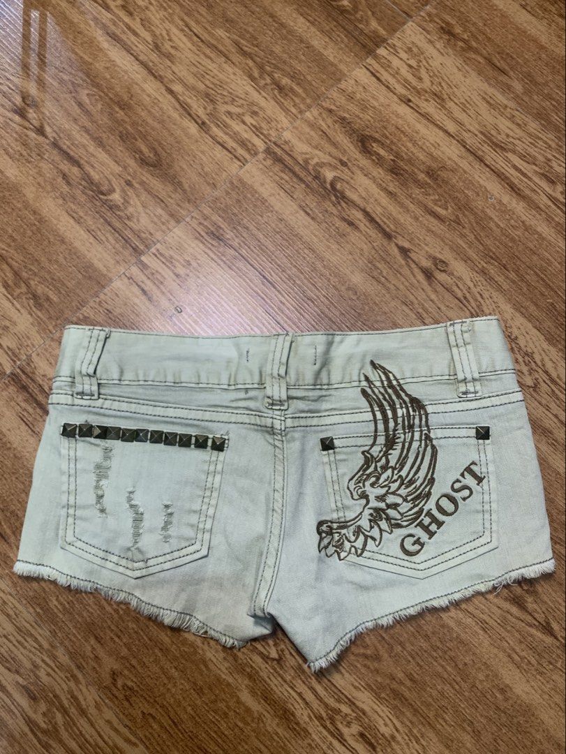 GLAMOUR de GHOST Studded Ripped Denim Shorts (Category: Shorts) located in Davao. Submitted by legitseller1111 (Listing ID 1463783772, Image 2). Description: - Light wash denim shorts -Size 28-29 - Distressed rips for a edgy look - Studded detailing on front and back pockets - Unique 'GHOST' wing graphic on the back - Frayed hemline - Button and zip fly closure .