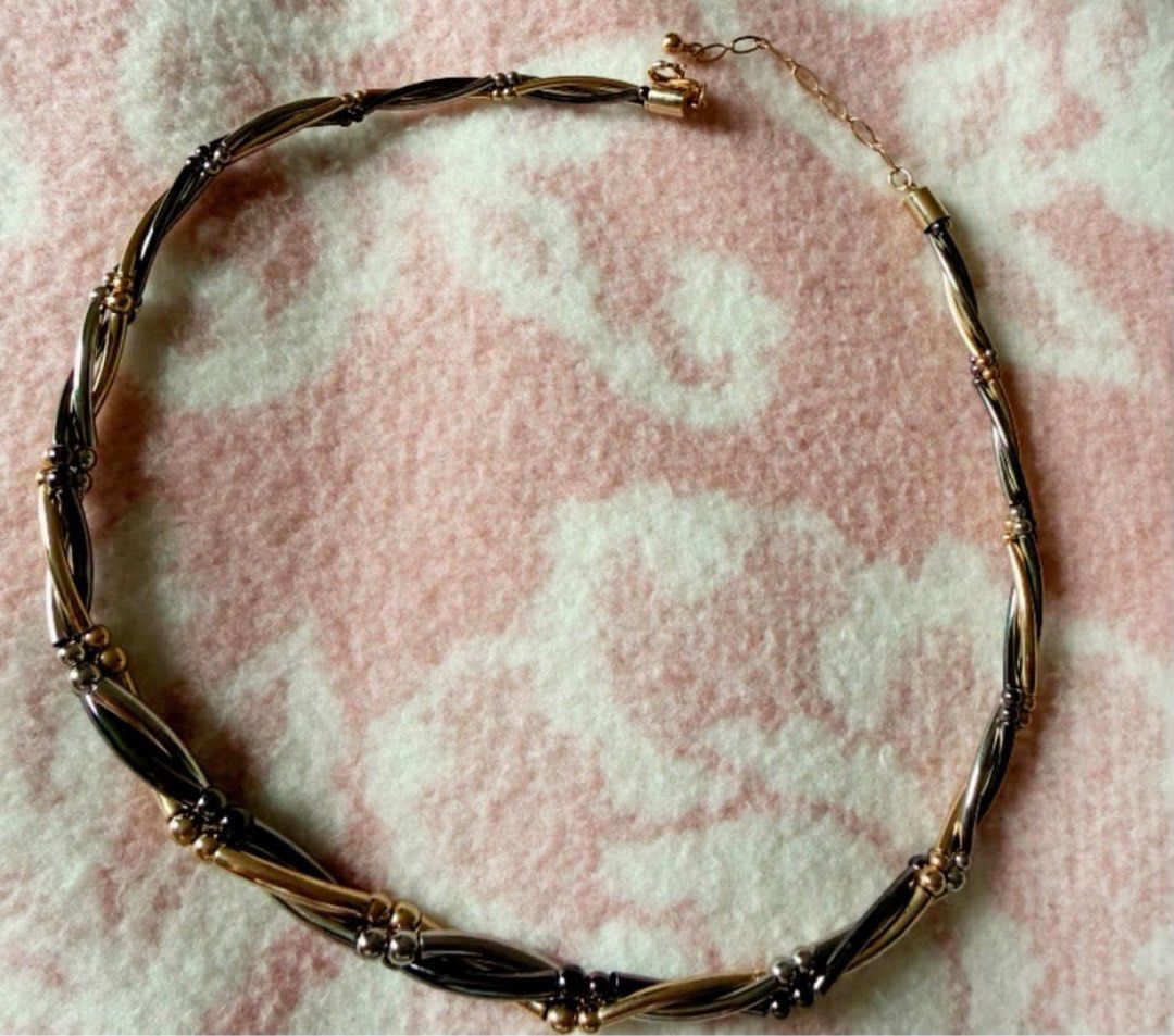 Gold plated necklace (Category: Necklaces) located in Manila. Submitted by annafinds (Listing ID 1463923390, Image 2). Description: A multi-tone twisted metal combination necklace featuring gold, silver, and dark-toned strands. ₱3,999 Open for layaway..