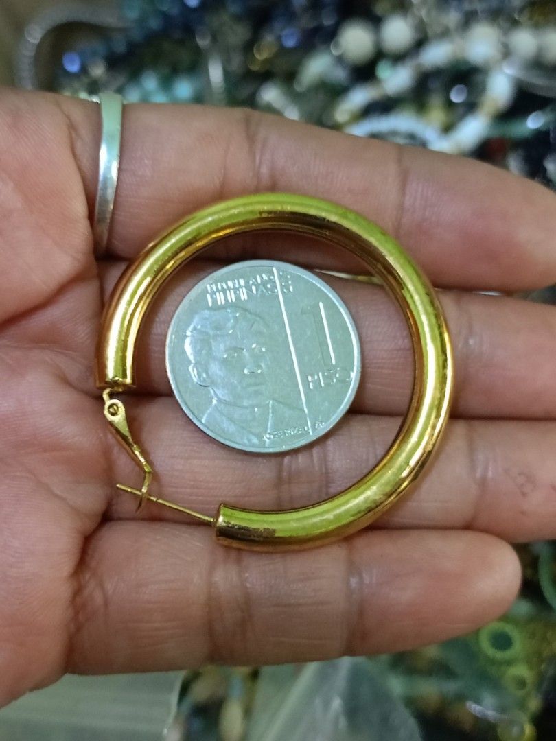 Goldtone Hoop Earrings (Category: Earrings) located in Bacoor. Submitted by bibelot03 (Listing ID 1463922057, Image 3). Description: - Classic gold hoop earrings - Medium size, ideal for daily wear - Lightweight and comfortable for all-day use - Easy to put on and take off - Versatile accessory that complements various outfits .