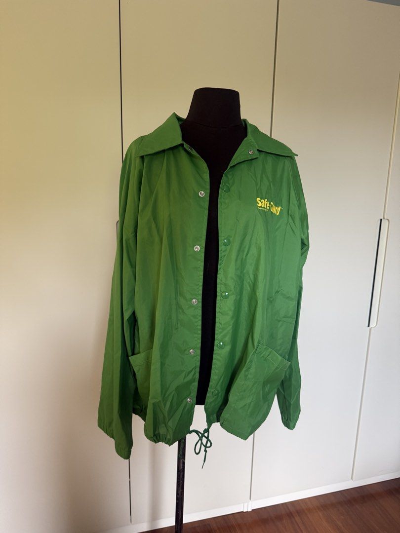 Green Nylon Jacket (Category: Coats, Jackets and Outerwear) located in Manila. Submitted by cristycrab247 (Listing ID 1463772138, Image 1). Description: - Green coach jacket - Features 'Safe-Guard' and '(fenbendazole)' logo on chest - Button-up front with convenient pockets - Adjustable drawstring hem for a customized fit - Made from lightweight material, ideal for layering - originally bought for a DIY project. Label should be easy to remove or 