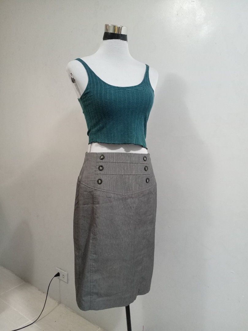 Grey Buttoned Pencil Skirt (Category: Skirts) located in Paranaque City. Submitted by janella11 (Listing ID 1463772201, Image 2). Description: - Grey high-waisted pencil skirt with unique four-button waist detail. - Perfect for creating versatile casual or semi-formal outfits. .