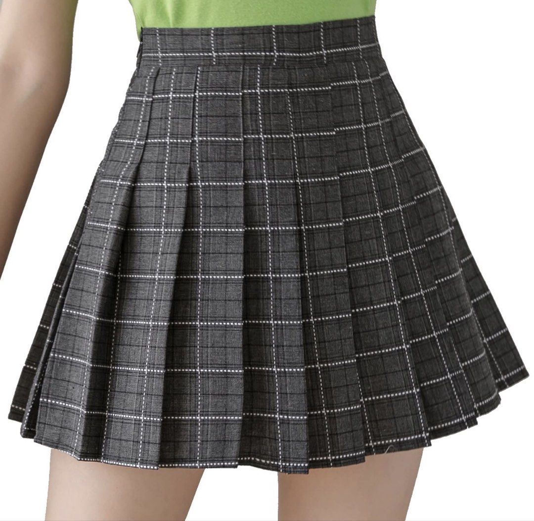 Grey Plaid Pleated Mini Skirt (Category: Skirts) located in Manila. Submitted by angelinem022726 (Listing ID 1463809482, Image 2). Description: - size 23 length 14 - Cute grey plaid pleated mini skirt - School uniform style - Ideal for preppy or Y2K fashion - Easy to pair with various tops and shoes - Suitable for casual wear or dressing up.