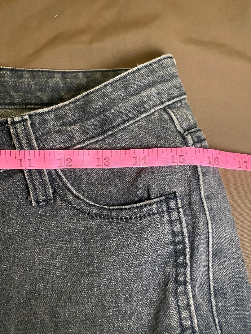 Grey Wash Split Hem High Waisted Jeans (Category: Jeans) located in San Pablo. Submitted by kisha_santonia (Listing ID 1463867581, Image 3). Description: - Grey wash denim jeans - High-waisted fit - Split hem detail on both legs - Ideal for casual wear - Measurements available in photos.