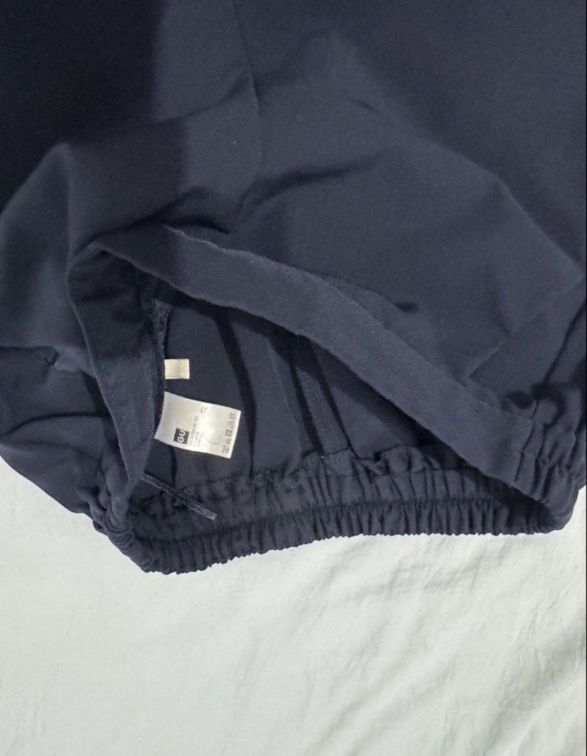 GU Stretch Ankle Pants Navy Blue (Category: Other Bottoms) located in Manila. Submitted by goodthingspreloved.92 (Listing ID 1463886033, Image 3). Description: - Navy blue ankle pants from GU - Comfortable elastic waistband - Features functional pockets - Ankle length design - Versatile for casual outings or work attire - Easy to style for various looks.