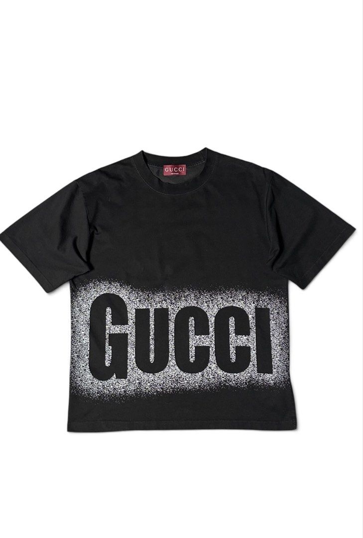 Gucci Black Spray Logo T-Shirt (Category: Tshirts & Polo Shirts ) located in Manila. Submitted by draftdrops (Listing ID 1463779969, Image 1). Description: Printed design , new release and excellent condition Width :22 Length :26 Size:large .