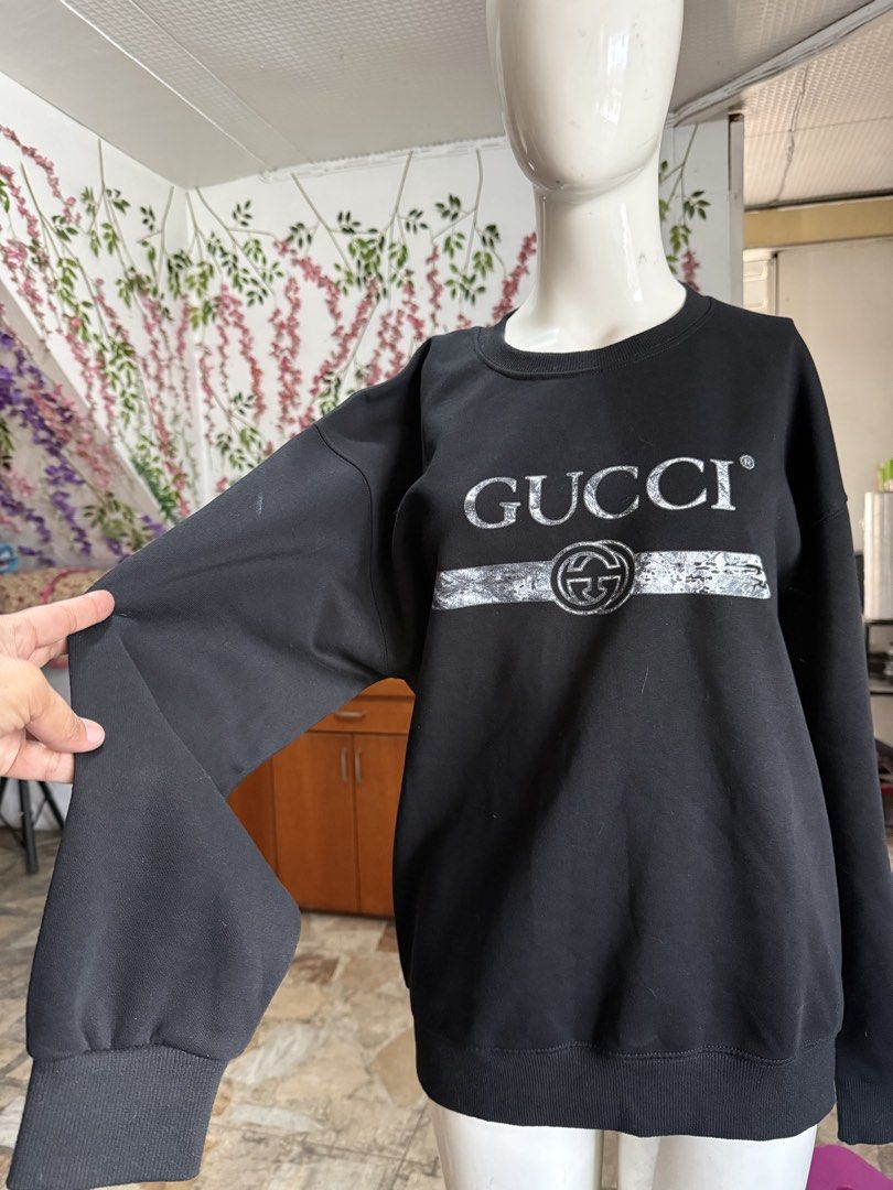 Gucci Black Sweatshirt with Logo (Category: Coats, Jackets and Outerwear) located in Cabuyao City. Submitted by arral (Listing ID 1463789181, Image 2). Description: - Authentic Gucci sweatshirt - Iconic Gucci logo across the chest - Size L (175/92A) Womens - Made in China - Ideal for casual wear - Please check photos for detailed condition.