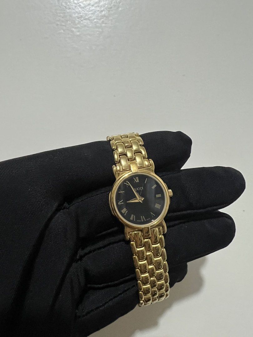 Gucci Gold Watch (Category: Luxury Watches) located in Antipolo. Submitted by cyloveak1328 (Listing ID 1463863223, Image 3). Description: Gucci watch 18K Gold Plated Swiss Made With Original Box and International warranty card Plastic at the back still intact .