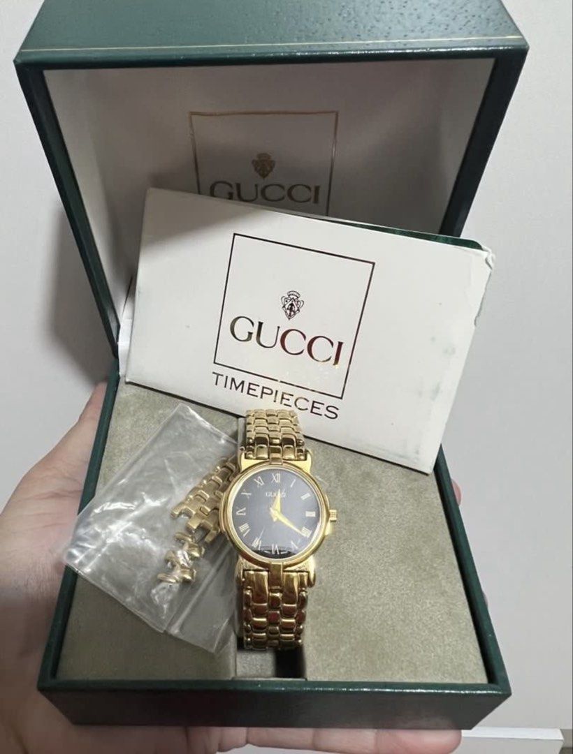Gucci Gold Watch (Category: Luxury Watches) located in Antipolo. Submitted by cyloveak1328 (Listing ID 1463863223, Image 1). Description: Gucci watch 18K Gold Plated Swiss Made With Original Box and International warranty card Plastic at the back still intact .