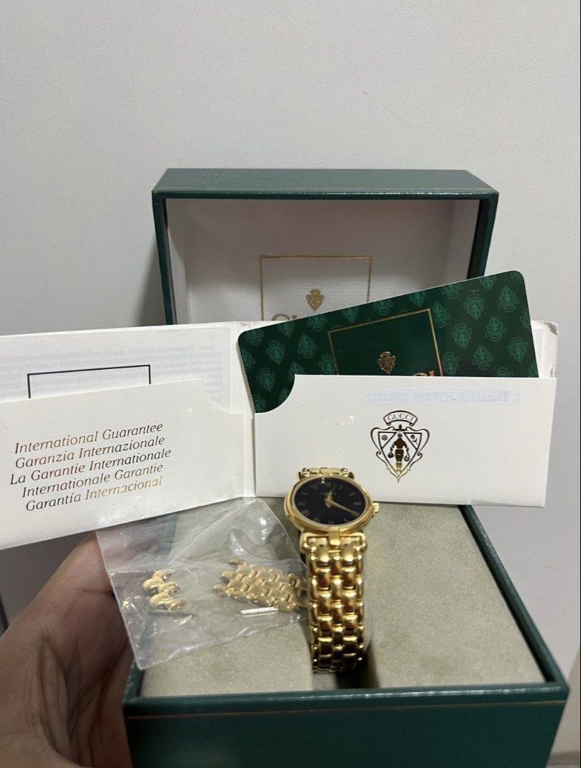Gucci Gold Watch (Category: Luxury Watches) located in Antipolo. Submitted by cyloveak1328 (Listing ID 1463863223, Image 2). Description: Gucci watch 18K Gold Plated Swiss Made With Original Box and International warranty card Plastic at the back still intact .