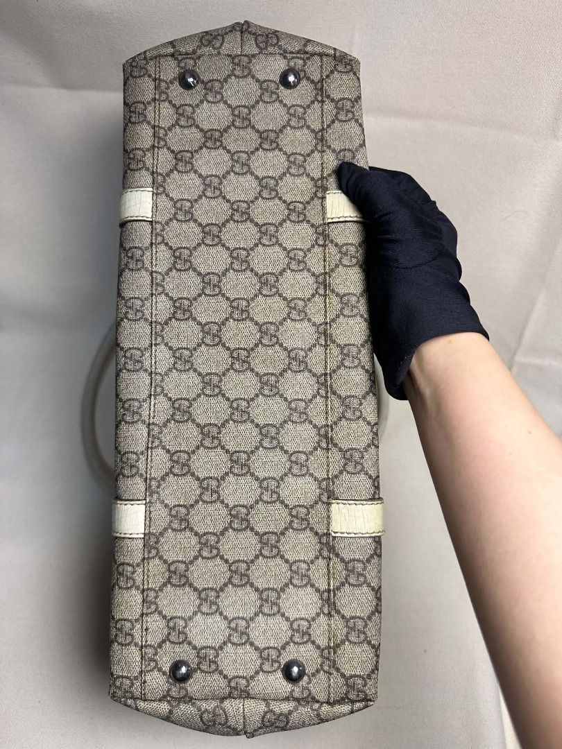 Gucci Supreme Joy Tote Bag (Category: Luxury Bags & Wallets) located in Caloocan City. Submitted by anewchapterluxx (Listing ID 1463772457, Image 3). Description: INCLUSIONS: - certificate of authenticity - dust bag CONDITION: B Rank 7/10 (Well used) - Classic Gucci monogram canvas handbag - Beige and brown GG pattern - Leather trim and details - Clean interior - Minor signs of wear on exterior leather trim - Authentic guaranteed.