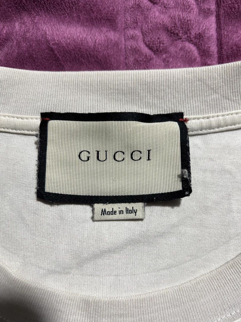 Gucci White T-Shirt with Bear Logo (Category: Shirts) located in Tagoloan. Submitted by rainebutro69475 (Listing ID 1463898676, Image 3). Description: - Authentic White Gucci T-Shirt - Features iconic green Gucci logo - Adorable teddy bear graphic with GG pattern - Made in Italy - A must-have for any Gucci enthusiast.