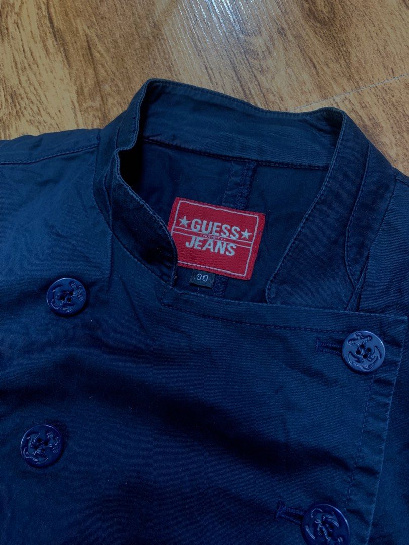 Guess Jeans Double Breasted Navy Jacket Size 90 (Category: Coats, Jackets and Outerwear) located in Davao. Submitted by legitseller1111 (Listing ID 1463784374, Image 2). Description: - Navy blue Guess Jeans jacket - Double-breasted style with button closure - Features a collar and two front pockets - Made in Korea - Tag size: 90.