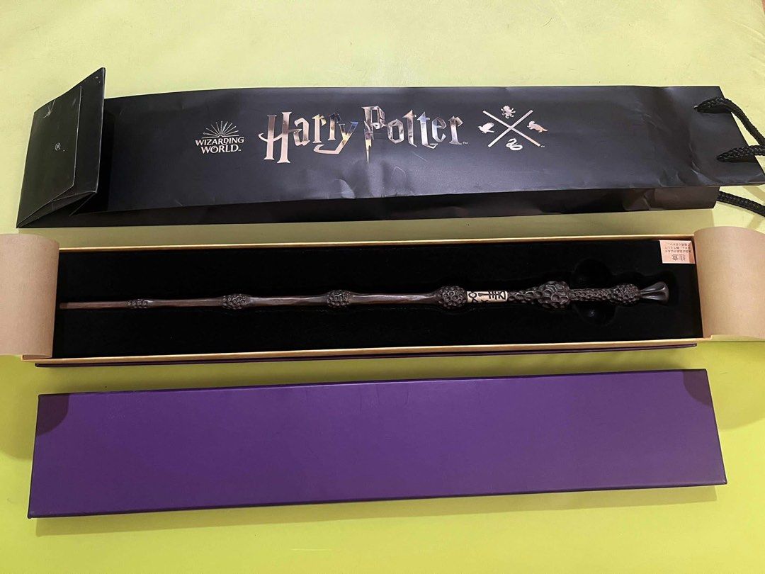 Harry Potter Dumbledore Wand with Box (Category: Western Merchandise) located in Manila. Submitted by cosmicriver.212058 (Listing ID 1463895556, Image 2). Description: - Authentic Dumbledore wand from the Wizarding World - Comes in original Harry Potter box - Features intricate, detailed design - Ideal for Harry Potter fans and collectors - Box is purple with gold lettering - Selling as is Original price 3200 .
