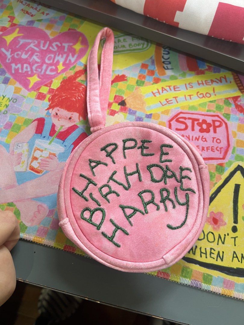 Harry Potter Miniso "Happy Birthdae Harry" pouch (Category: Purses & Pouches) located in Paranaque City. Submitted by guevssss (Listing ID 1463819321, Image 1). Description: - From Miniso x Harry Potter collection Cute pink round pouch - Embroidered with "Happy Birthdae Harry" in green - Features a small loop handle - Zipper closure for security - Perfect for coins, cards, or small essentials .