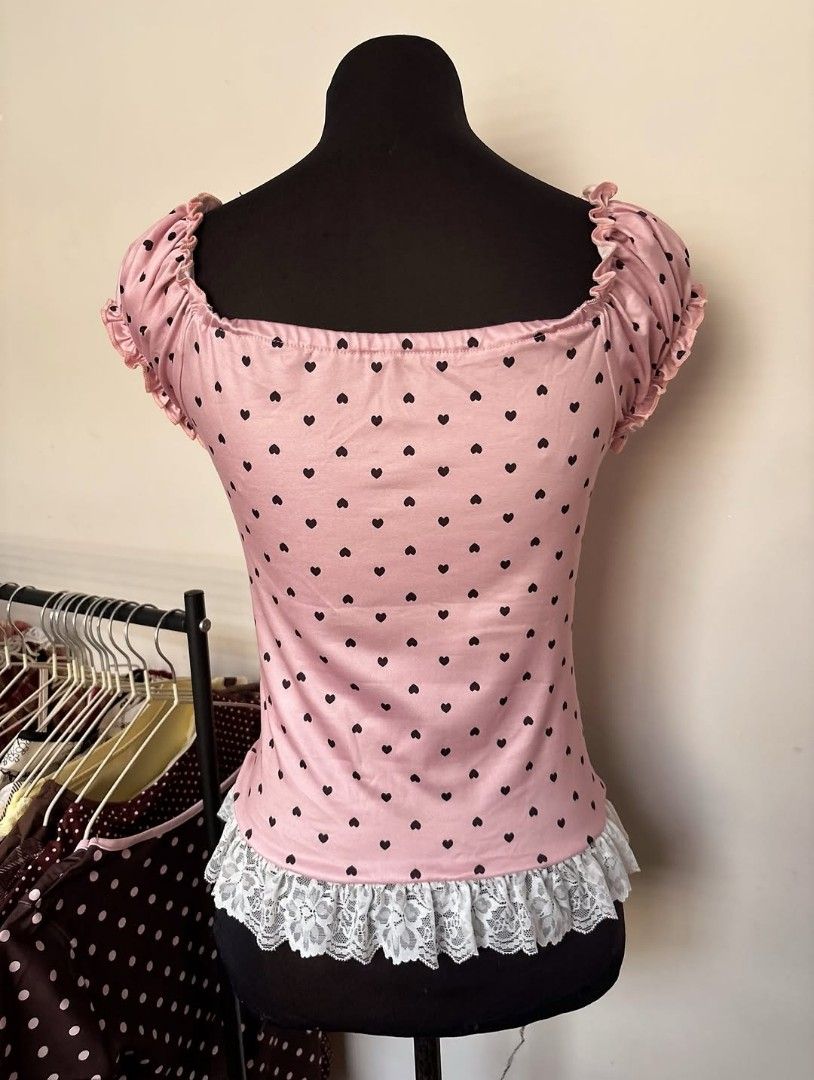 hearts puff sleeve (Category: Blouses) located in Rizal. Submitted by christine_eagle (Listing ID 1463769392, Image 2). Description: 🛒 ˖ ˚｡⋆ decluttering | wts lfb ph ₱450 + sf — hearts puff-sleeve top ❤️ • fits XS to M • heart print/detail • puff sleeves • see photos for actual condition and fit • wash before using sf should be shouldered by the buyer MOP: GCash t&cs: failure to pay on time will cost ₱50 per day (if DOP) no rush shipping cancel