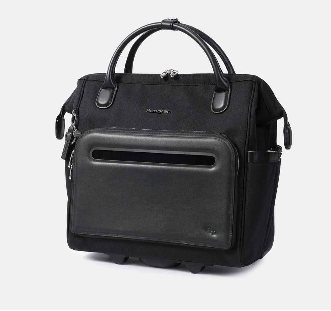Hedgren Laptop Bag with Wheels (Category: Briefcases) located in Manila. Submitted by carad__ (Listing ID 1463773593, Image 1). Description: FOR SALE Like new condition ✨ INTERIOR FEATURES •RFID blocking material •Extensive interior organisation including padded laptop & tablet sleeve, RFID pocket, volume paper holder and padded device pockets. •Removable inside pouch EXTERIOR FEATURES •Wide zipper opening with frame structure •Solid corner and b