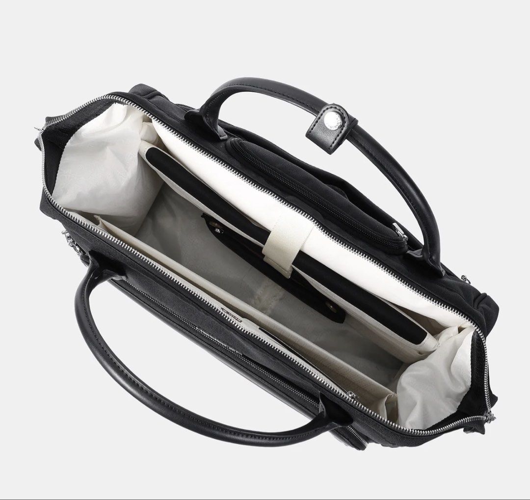 Hedgren Laptop Bag with Wheels (Category: Briefcases) located in Manila. Submitted by carad__ (Listing ID 1463773593, Image 3). Description: FOR SALE Like new condition ✨ INTERIOR FEATURES •RFID blocking material •Extensive interior organisation including padded laptop & tablet sleeve, RFID pocket, volume paper holder and padded device pockets. •Removable inside pouch EXTERIOR FEATURES •Wide zipper opening with frame structure •Solid corner and b