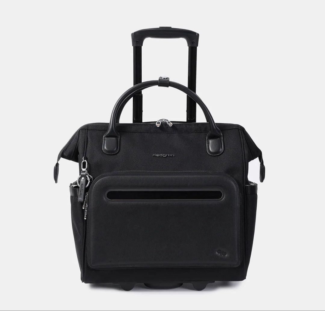 Hedgren Laptop Bag with Wheels (Category: Briefcases) located in Manila. Submitted by carad__ (Listing ID 1463773593, Image 2). Description: FOR SALE Like new condition ✨ INTERIOR FEATURES •RFID blocking material •Extensive interior organisation including padded laptop & tablet sleeve, RFID pocket, volume paper holder and padded device pockets. •Removable inside pouch EXTERIOR FEATURES •Wide zipper opening with frame structure •Solid corner and b