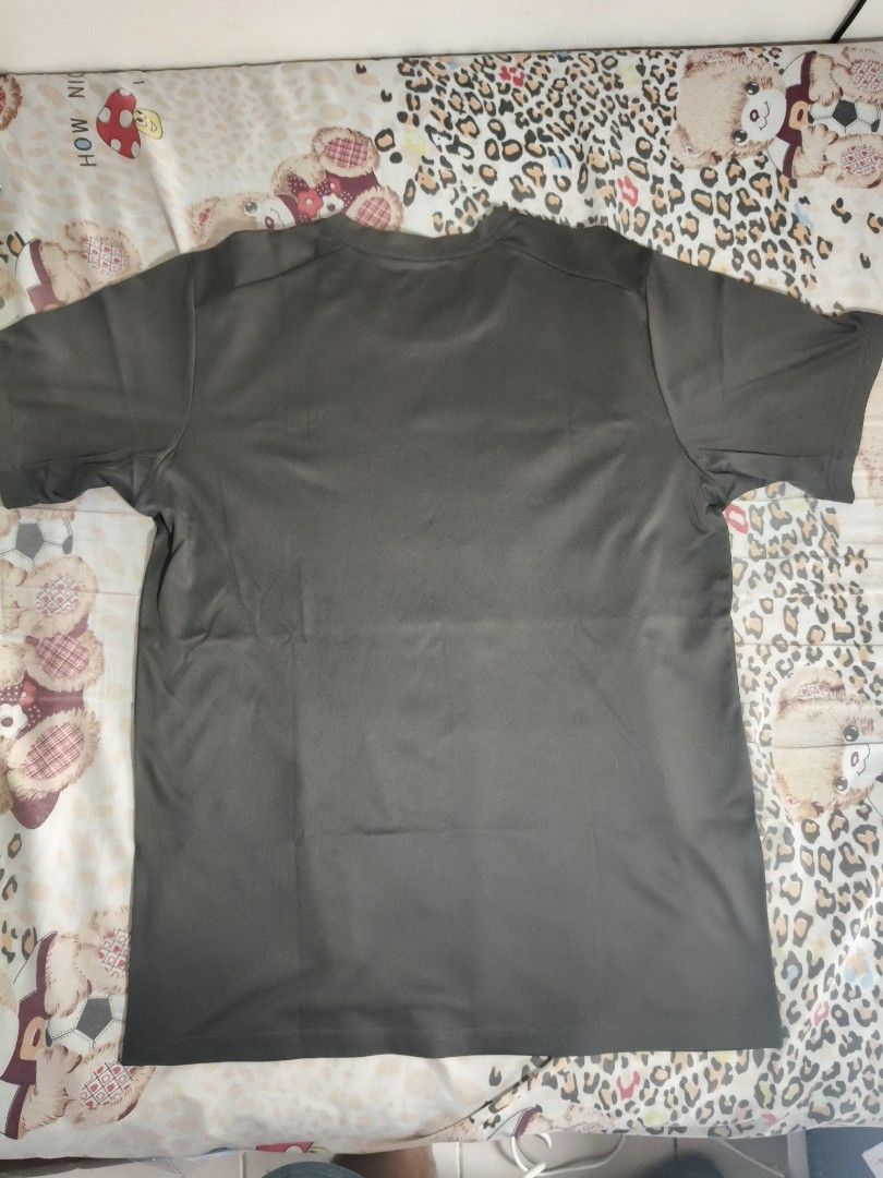 Herbalife Nutrition T-shirt (Category: Tshirts & Polo Shirts ) located in Lapu Lapu. Submitted by hooman422 (Listing ID 1463808314, Image 3). Description: - Dark Grey t-shirt with Herbalife Nutrition logo - Short sleeves, crew neck - Geometric pattern on the front - Plain grey back - Perfect for workouts or casual wear.