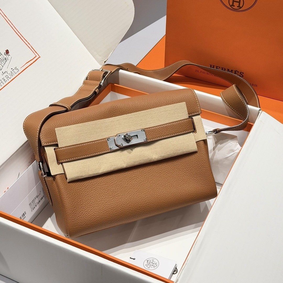 Hermes Kelly Messenger Bag Togo (Category: Luxury Bags & Wallets) located in Manila. Submitted by poppyany (Listing ID 1463771228, Image 1). Description: Hermes Kelly Messenger Bag in Gold Togo, Palladium Hardware. Comes complete. Never used. Bought this at 78K.