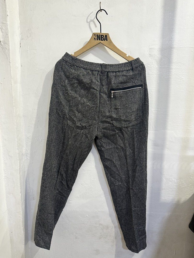 Herringbone Pattern Trousers with Zipper Pockets (Category: Trousers) located in San Jose del Monte. Submitted by bizzybeebyhgc (Listing ID 1463785981, Image 3). Description: - Grey herringbone trousers - Straight leg fit - Zipper pockets on front left and back right - Button and zip closure at the front - Comfortable for everyday wear - Versatile for casual or smart casual outfits - W:28, L:36.