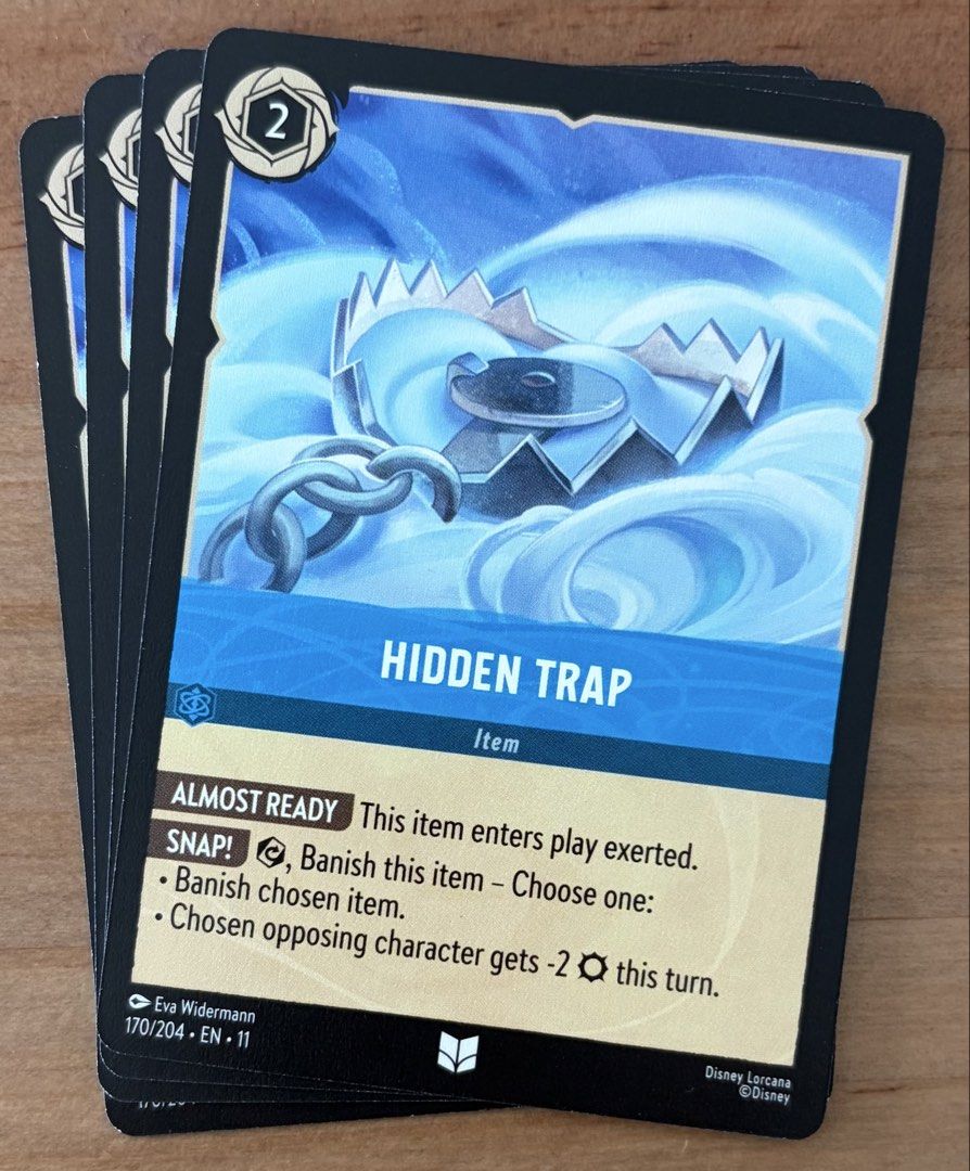 Hidden Trap | Disney Lorcana Cards ~ Winterspell (Category: Raw Singles) located in Makati City. Submitted by cardlab (Listing ID 1463927126, Image 1). Description: Items are 💯 authentic/original/legit. About The Card: •Language: EN • Number: 170/204 • Uncommon • Normal FOR: • Cards ₱99 and below with Card Sleeves • Cards ₱100 and up with Card Sleeves and Used Toploader • ₱10 for Bnew Tops Packaging (If Shipping): ✔️ Plastic cover ✔️ Cardboard ✔