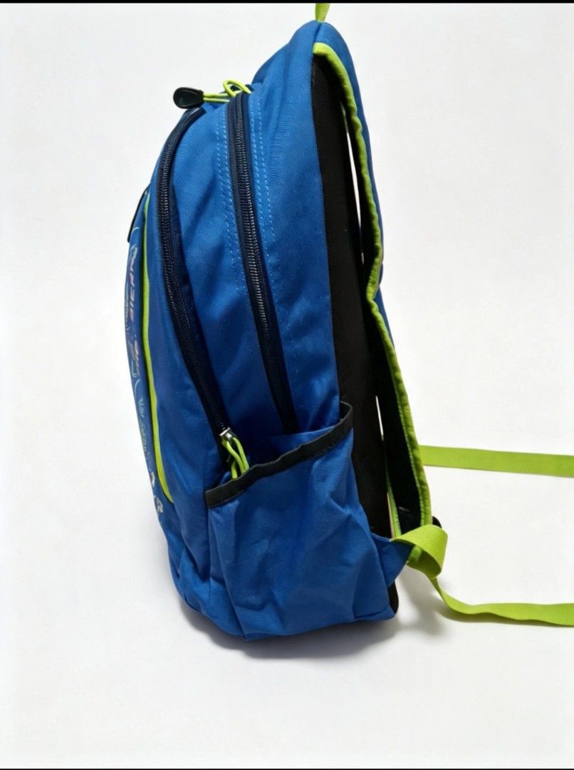 High Sierra Blue Backpack with Topographic Map Design (Category: Backpacks) located in Angeles City. Submitted by anneps (Listing ID 1463840727, Image 3). Description: - Blue High Sierra backpack - Unique neon yellow topographic map design - Multiple interior compartments for organization - Side pocket for water bottle - Padded shoulder straps for maximum comfort - Ideal for school, hiking, or day trips.