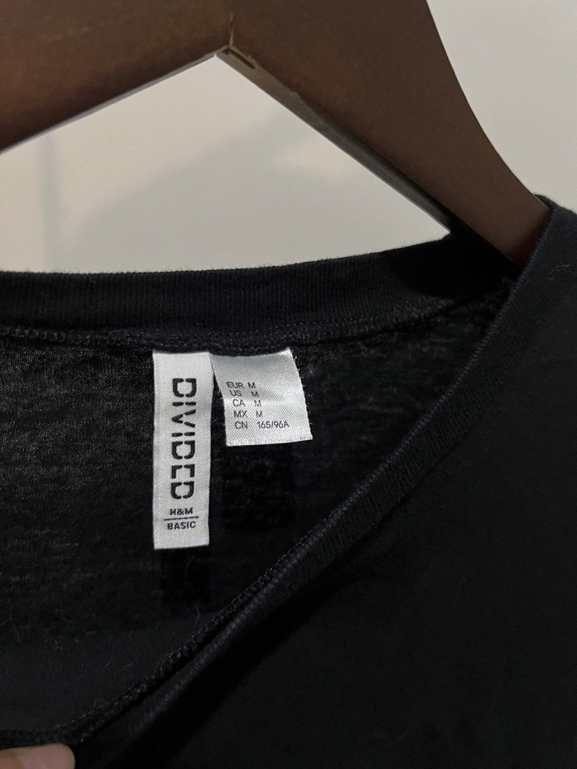 H&M black tshirt (2pcs) (Category: Shirts) located in Quezon City. Submitted by styleandcomfort (Listing ID 1463831107, Image 2). Description: Store bought from h&m Got this around 799-999 per pc. Sold per piece - 200.00 Message me for inquiries 😊.