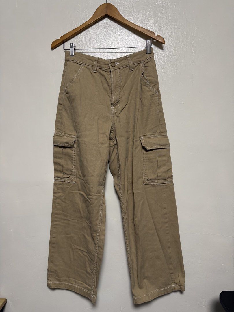 H&M Divided Khaki Cargo Pants (Category: Jeans) located in Manila. Submitted by don_p (Listing ID 1463864967, Image 1). Description: - H&M Divided khaki cargo pants - Relaxed fit for comfort - Multiple functional pockets - Stylish white contrast stitching - Versatile for casual outfits - Easy to pair with various tops.