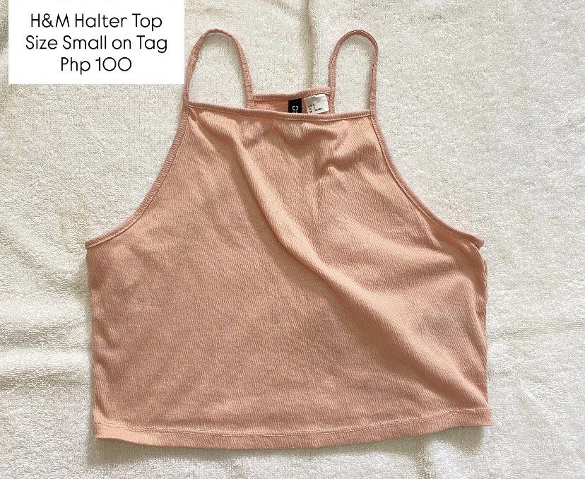 H&M Halter Top (Category: Sleeveless) located in Imus. Submitted by theninetiesboxph (Listing ID 1463774591, Image 1). Description: - Brand: H&M - Color: Soft pinkish-peach - Style: Halter top - Texture: Ribbed - Size: Small (S) - Condition: Great for casual wear or layering - Price: Php 100.