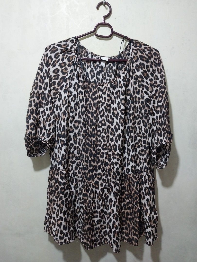 H&M Leopard Print Tiered Midi Dress (Category: Dresses) located in Manila. Submitted by PrinceDani.Clothing (Listing ID 1463817554, Image 3). Description: h&m leopard print midi dress small on tag large fit 26in width 30in length excellent condition .